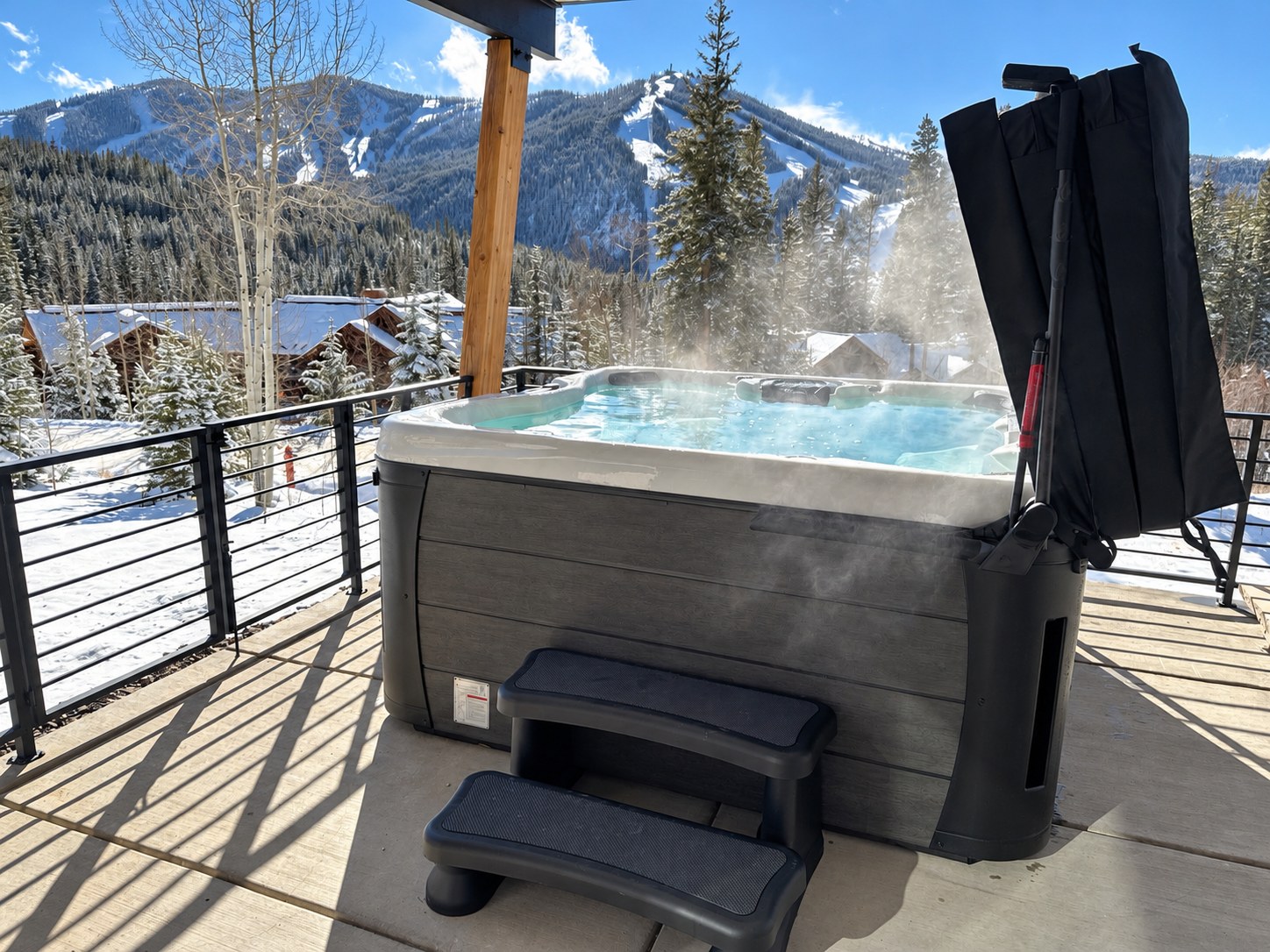 Outdoor hot tub and mountain scenery